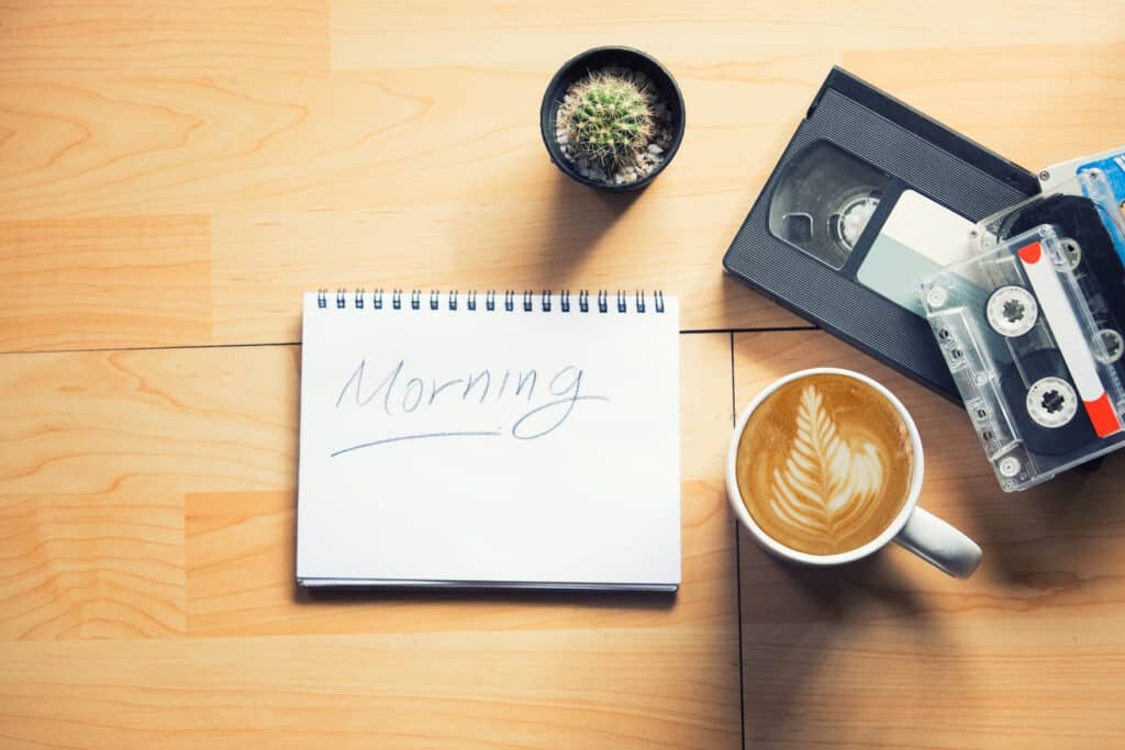 "morning" writ on paper latte art and retro tape,video.